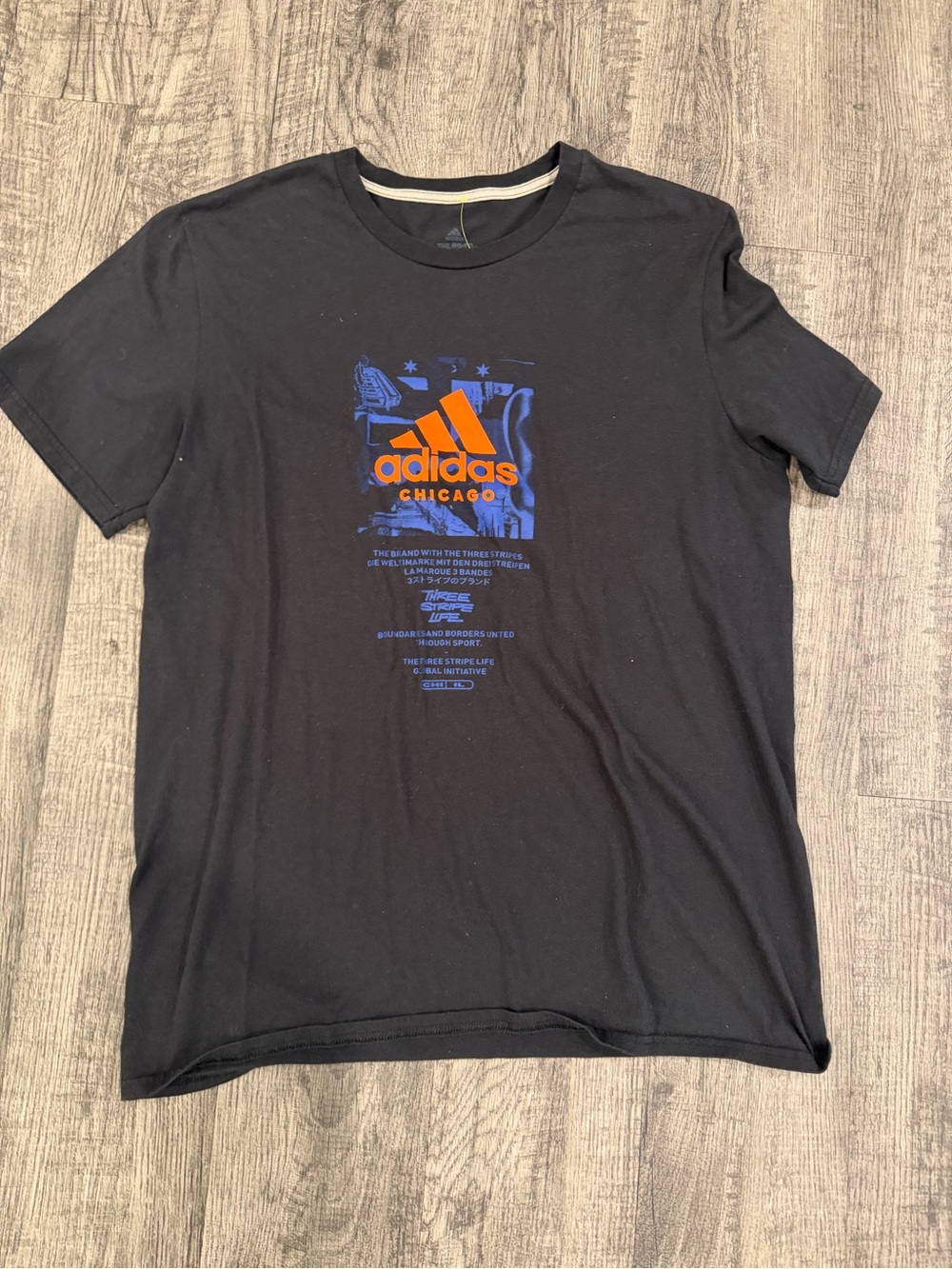 adidas Black Short-Sleeve Tee with Orange and Blue Logo